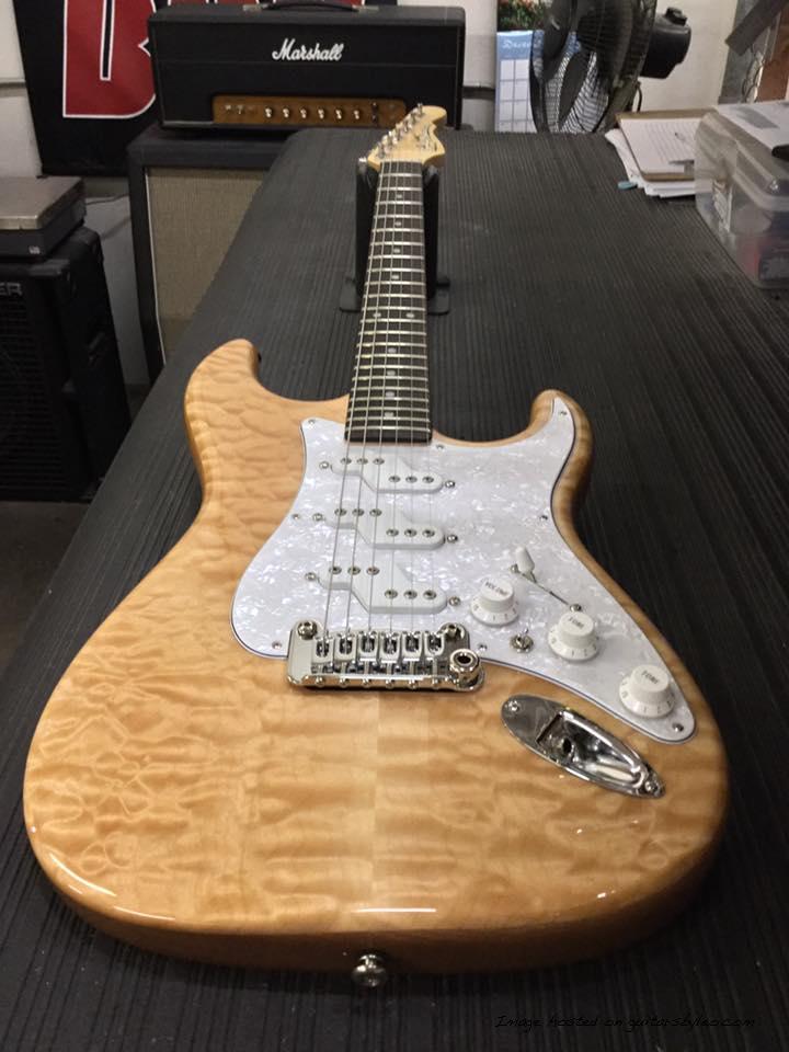 Comanche in Natural Gloss over quilt maple on swamp ash