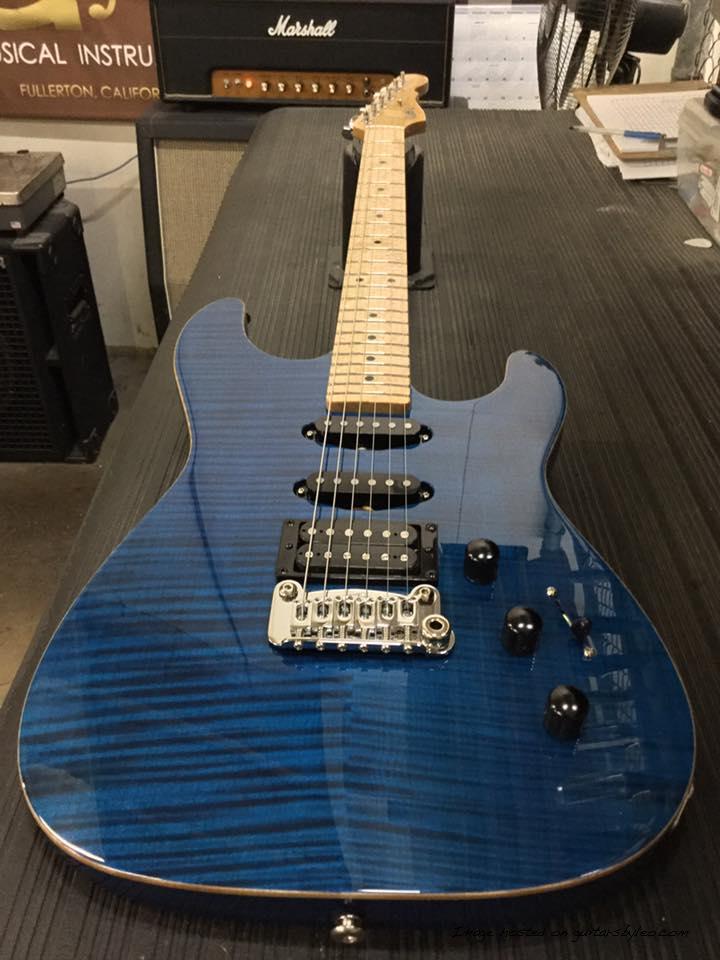 Legacy HSS RMC in Clear Blue over flame maple on swamp ash