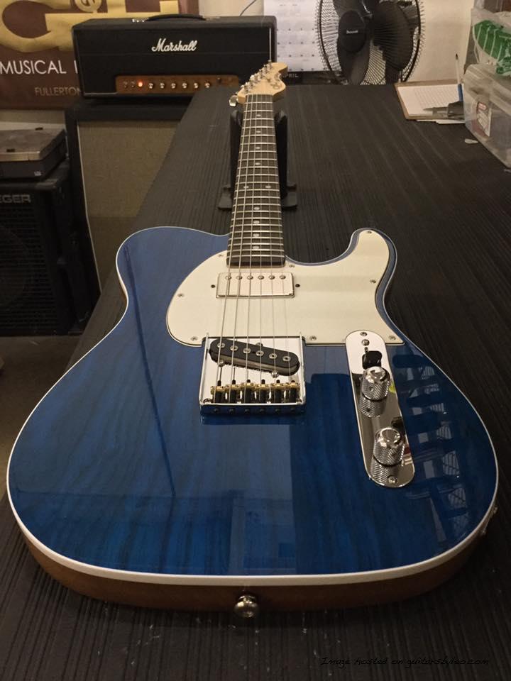 ACBB Clear Blue swamp ash top on Natural Gloss Okoume back