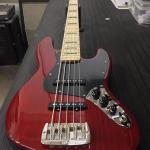 JB-5 in Clear Red over swamp ash black block inlays