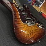 S-500 in Old School Tobacco Sunburst over flame maple on swamp ash body close up