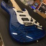 Legacy HSS in Clear Blue over quilt maple on swamp ash CLF1705001 body close up