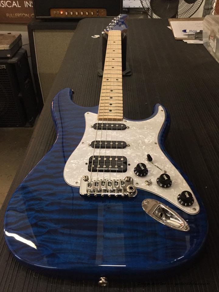 Legacy HSS in Clear Blue over quilt maple on swamp ash CLF1705001