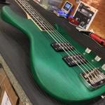 L-2500 in Clear Forest Green Frost over swamp ash body close up