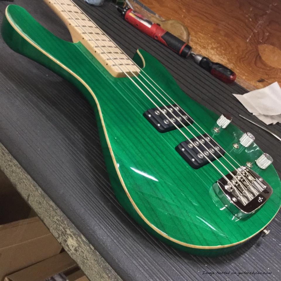 Here's an L-2000 in Clear Forest Green over empress, wood binding, quartersawn maple neck with Clear Satin finish, matching head