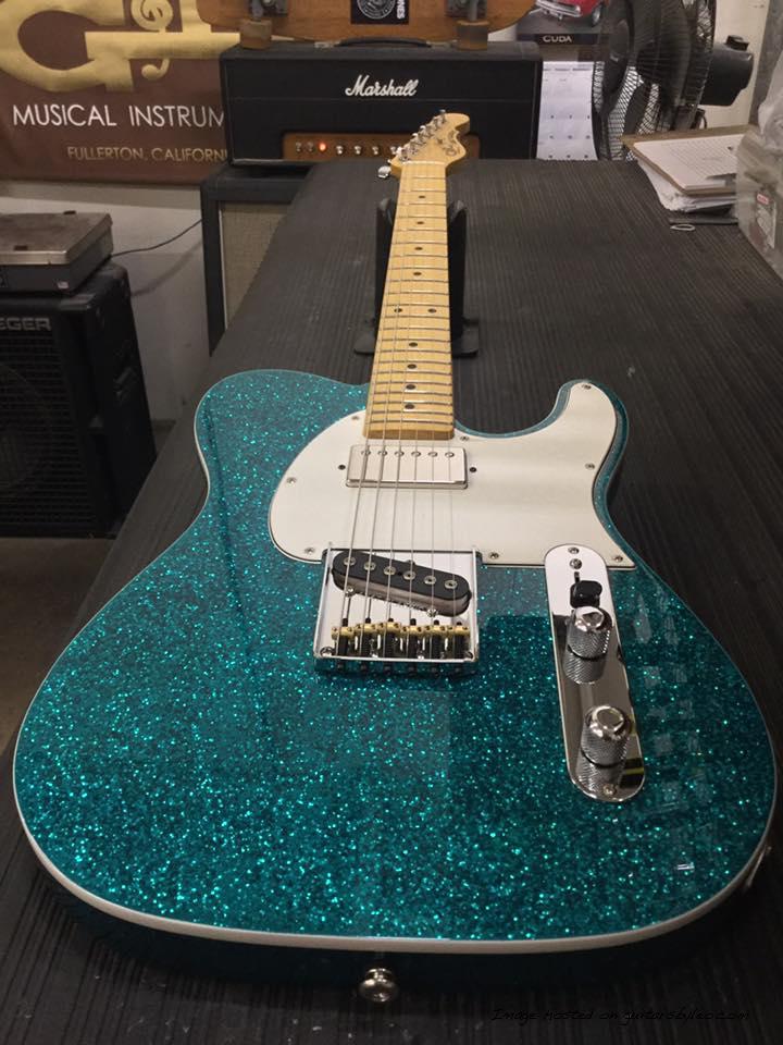 Here's an ASAT Classic Bluesboy in Turquoise Metal Flake over basswood CLF1703017
