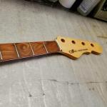 Custom Shop L-2000 neck has one of the most unique Caribbean Rosewood fingerboards