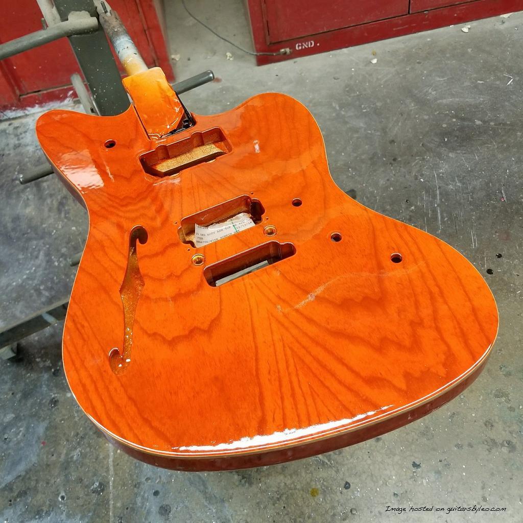G&L Custom Shop Doheny Semi-Hollow in Clear Orange with natural wood binding