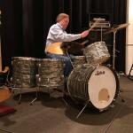 Johnny McLaren on a drum kit