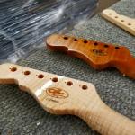Roaster and natural Flame Maple necks