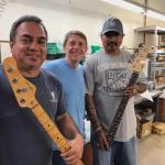 So here’s Memo with the old original neck, Dave (me), and Marco with the new neck he sanded to match the old slim headstock
