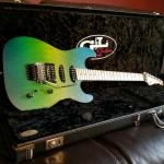 Invader in Green Burst Frost with a 3A Flame Maple neck-1