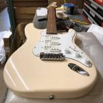 Tribute Series Comanche in Olympic White over mahogany, matching headstock up top