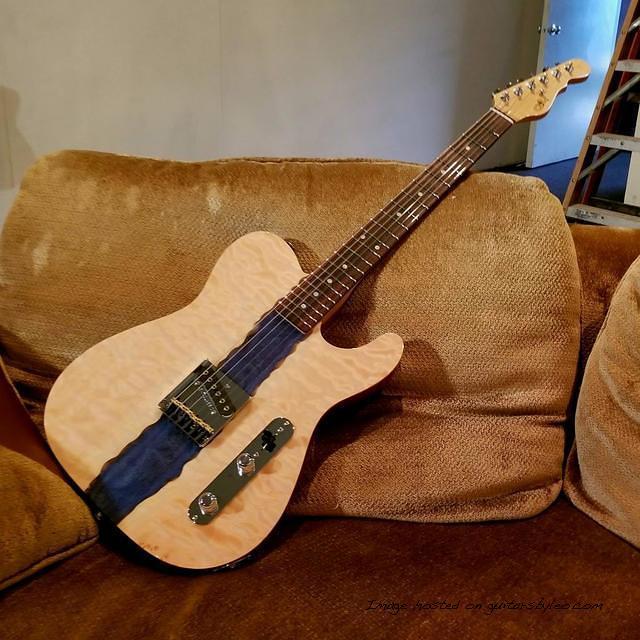 ASAT Solamente MFD features a Quilted Maple Top with a resin 22river 22 running thru the middle