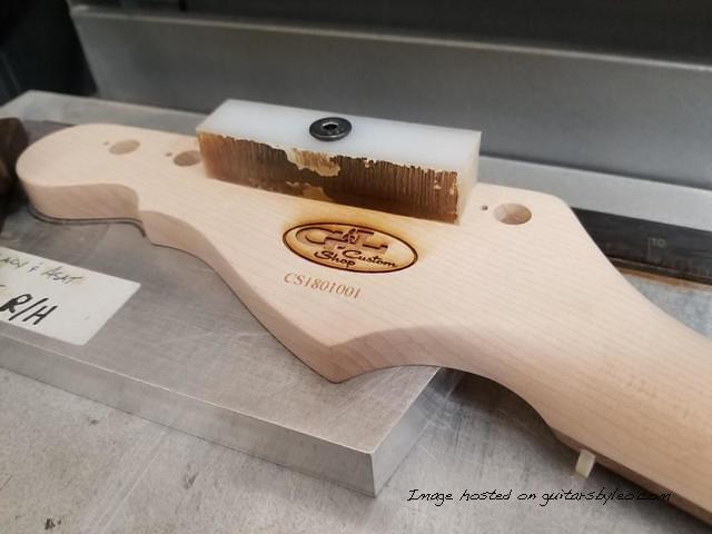 Jake s Custom Shop Legacy neck being laser engraved and serialized