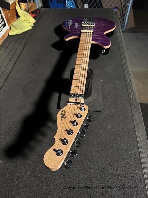 The G-200 style body with deeper treble-side cutaway has been built-4