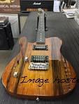 Lefty AD in Honeyburst on black limba on mahogany