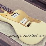 CS Doheny in Vintage White with gold anodized pickguard