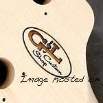 Closeup of laser etched G amp L Custom Shop logo