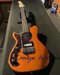 Lefty Fallout in Tangerine Metallic over alder, tortoise guard, Dual Fulcrum vibrato