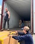 The guys are unloading a 40-foot container of G&L Tribute Series instruments
